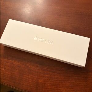 *BRAND NEW APPLE WATCH* 46mm Gold Titanium. Still in the box.
